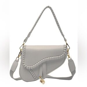 White spring summer saddle bag with gold hardware and braided shoulder s…